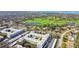 Scenic aerial view of the condo community with golf course in the background, offering stunning views at 701 Poinsettia Rd # 322, Belleair, FL 33756