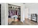 Walk-in bedroom closet featuring ample storage space, shelves, and rods for clothing at 701 Poinsettia Rd # 322, Belleair, FL 33756