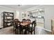 Open dining room view into the bright and updated kitchen area at 701 Poinsettia Rd # 322, Belleair, FL 33756