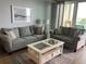 Cozy living room featuring comfortable sofas, stylish decor, and a light-filled atmosphere at 706 Bayway Blvd # 502, Clearwater Beach, FL 33767