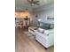 Open-concept living and dining area with modern furnishings and lots of natural light at 706 Bayway Blvd # 502, Clearwater Beach, FL 33767