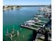 Scenic waterfront view of boats docked along the bay, showcasing beautiful waterfront living at 706 Bayway Blvd # 502, Clearwater Beach, FL 33767
