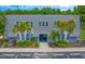 Condo exterior showcasing its well-maintained facade and landscaping at 720 Lyndhurst St # 1101, Dunedin, FL 34698