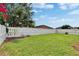 Well-maintained backyard featuring a spacious lawn at 7603 Wood Violet Dr, Gibsonton, FL 33534