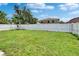 Well-maintained backyard featuring a spacious lawn at 7603 Wood Violet Dr, Gibsonton, FL 33534