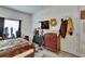Bedroom showcasing natural light and storage with nice size closet with vintage dresser at 7603 Wood Violet Dr, Gibsonton, FL 33534