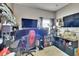 Large bedroom with big-screen TVs and gaming setup at 7603 Wood Violet Dr, Gibsonton, FL 33534