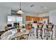 Eat-in kitchen with countertop seating and overhead lighting at 7603 Wood Violet Dr, Gibsonton, FL 33534