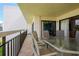 Relax on the spacious balcony, complete with seating and scenic views of the complex at 7893 Sailboat Key S Blvd # 304, South Pasadena, FL 33707