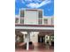 A well-maintained, multi-story building featuring architectural design and a welcoming covered entrance at 7893 Sailboat Key S Blvd # 304, South Pasadena, FL 33707