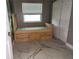 Bright bedroom with stylish built-in bed and modern flooring at 820 Crenshaw Lake Rd, Lutz, FL 33548
