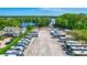 Overhead view of the property's boat and RV parking area, with lake views at 900 Maclaren N Dr # D, Palm Harbor, FL 34684