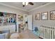 Bright bedroom featuring a crib, storage and closet space at 910 E Crenshaw St, Tampa, FL 33604