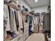 Spacious walk-in closet with ample storage, shelving, and plenty of room for organizing clothes and accessories at 910 E Crenshaw St, Tampa, FL 33604