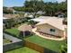 Aerial view showcasing the home's landscaped backyard and gazebo at 9951 121St St, Seminole, FL 33772