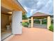 Backyard view featuring a gazebo accessible from the bathroom with an open door at 9951 121St St, Seminole, FL 33772