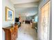 Inviting foyer with stylish tile flooring that opens to a bright and spacious living area at 9951 121St St, Seminole, FL 33772