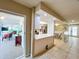 Spacious living area next to kitchen and featuring tile floors and natural light at 9951 121St St, Seminole, FL 33772
