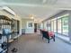 Spacious sunroom with windows all around providing lots of natural light and relaxation at 9951 121St St, Seminole, FL 33772