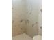 Shower featuring marble tiled walls at 10444 Fordham St, Spring Hill, FL 34608