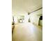 Spacious two car garage with washer/dryer, water heater and cabinet storage at 10444 Fordham St, Spring Hill, FL 34608