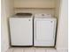 Dedicated laundry area featuring a washer and dryer set at 10921 Brightside Dr, Tampa, FL 33624