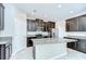Stylish kitchen with granite countertops, stainless steel appliances, and plenty of storage at 11011 Little Blue Heron Dr, Riverview, FL 33579