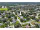 Neighborhood aerial featuring tree-lined streets, well-manicured lawns, and a serene residential setting at 12405 Pathway Ct, Riverview, FL 33569
