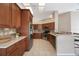 Eat-in kitchen featuring stainless appliances, tile floors and backsplash, and breakfast bar at 12405 Pathway Ct, Riverview, FL 33569