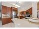 Modern kitchen with stainless steel appliances, granite countertops, tile floors and backsplash at 12405 Pathway Ct, Riverview, FL 33569
