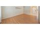 Bright living room with wood floors, neutral walls, and a spacious entryway at 12405 Pathway Ct, Riverview, FL 33569