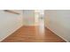 Bright living room features hardwood floors, natural light, and a view into other rooms at 12405 Pathway Ct, Riverview, FL 33569