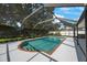 A backyard featuring a screened in pool with clear water at 12405 Pathway Ct, Riverview, FL 33569