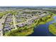 An elevated view of a community of homes, close to a recreational lake at 12607 Pensacola Ct, Riverview, FL 33579