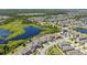 An aerial view showcasing the community, ponds, and landscaping at 12607 Pensacola Ct, Riverview, FL 33579