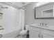 Clean bathroom featuring modern fixtures, a spacious vanity, and a shower-tub combo at 12607 Pensacola Ct, Riverview, FL 33579