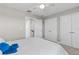 Spacious bedroom with ample closet space and a ceiling fan at 12607 Pensacola Ct, Riverview, FL 33579