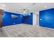 Large bonus room with stylish paint, neutral carpet, and ceiling fan at 12607 Pensacola Ct, Riverview, FL 33579