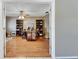 Spacious home office with built-in bookshelves, a ceiling fan, and hardwood floors at 15820 Sapwood St, Tampa, FL 33624