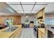 Bright kitchen area features stainless steel appliances and a casual dining space with backyard views at 15820 Sapwood St, Tampa, FL 33624
