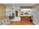Open kitchen and breakfast nook featuring ample natural light and seamless access to adjacent living areas for easy entertaining at 15820 Sapwood St, Tampa, FL 33624