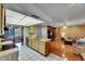 Open kitchen provides seamless access to the living room, creating a harmonious space for cooking and socializing at 15820 Sapwood St, Tampa, FL 33624