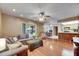 Relaxing living room with a sliding door to the backyard, providing easy access to outdoor living and entertainment at 15820 Sapwood St, Tampa, FL 33624