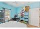 Well-organized bedroom with ample shelving and storage solutions at 1605 Prescott S St, St Petersburg, FL 33712