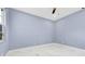 Empty bedroom with marble-style flooring and a window for natural light at 1716 Bermuda Ct, Safety Harbor, FL 34695