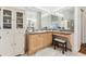 Bathroom featuring a vanity with lighting, cabinetry, and a stool at the makeup area at 17906 Loretta Ln, Lutz, FL 33548