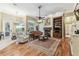 Cozy living room featuring a fireplace, built-in bookcase, and comfortable seating arrangement at 17906 Loretta Ln, Lutz, FL 33548