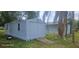Exterior view of a shed with sturdy metal construction and convenient double door access at 1908 S Kingsway Rd, Seffner, FL 33584