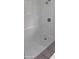 Clean and modern all-white shower stall, ready for relaxation and refreshment at 1908 S Kingsway Rd, Seffner, FL 33584
