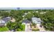 Aerial view of the property showcasing mature trees and landscaping and the surrounding neighborhood at 206 N Beverly Ave # 1/2, Tampa, FL 33609